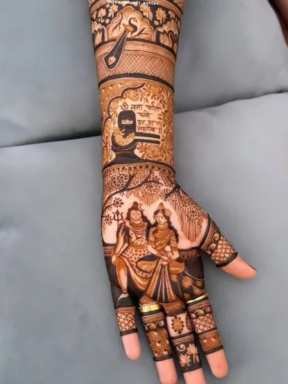 A close-up of the palm from the previous design, showing the detailed portrait of Lord Shiva and Parvati.