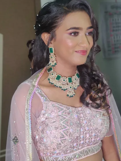Another beautiful shot of Ankita. The green in her jewelry was a lovely contrast to the pink tones of her outfit and makeup.