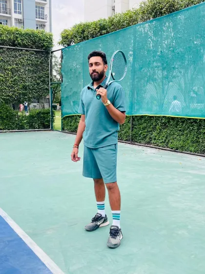As a coach, I am dedicated to helping you achieve your goals. This is me on the court, ready to work on building your skills, shaping your mindset, and turning you into the player you want to be.