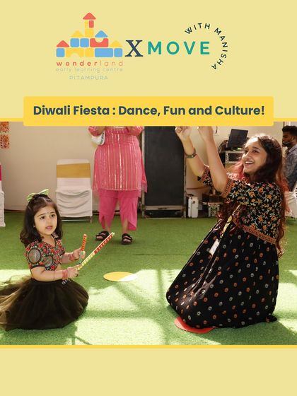 Celebrating Diwali with a special Dandiya fiesta for kids. I'm showing one of our youngest movers how to hold the dandiya sticks. We make sure our festive events are fun and accessible for all ages.