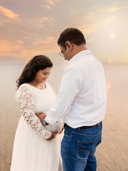 A tender moment between a couple at sunset on the beach. I guide them to connect and focus on each other, letting the beautiful surroundings do the rest.
