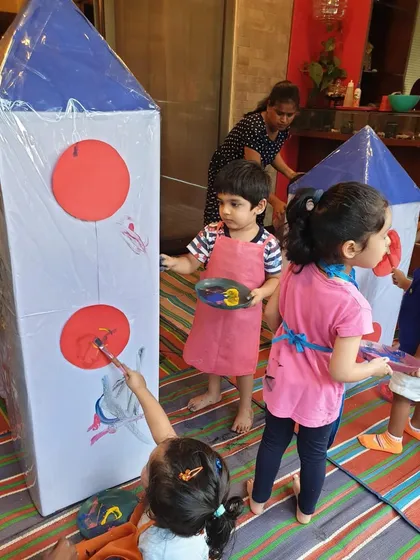 3, 2, 1, blast off! During our space-themed playdate, the kids got to paint their very own life-sized cardboard rockets. I love providing large-scale projects like this to encourage big, bold creativity.
