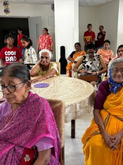 The audience of residents at The Little Sisters of the Poor, with our student band visible in the background. Creating a connection between the performers and the audience is the ultimate goal.
