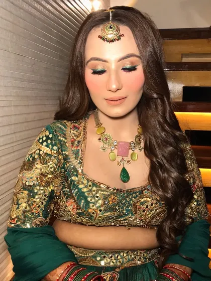 A serene portrait of the bride, her colorful jewelry adding a playful touch.