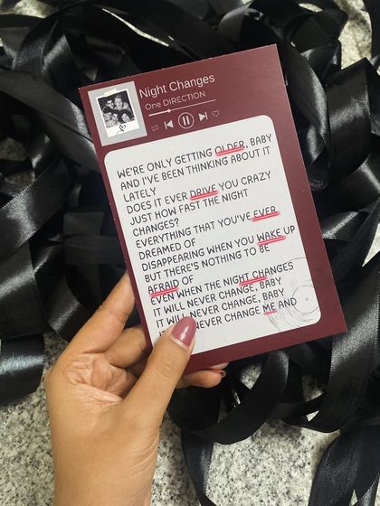 A close-up of the custom "Night Changes" lyric card we designed for our One Direction hampers. It's these little details that make a gift truly special.