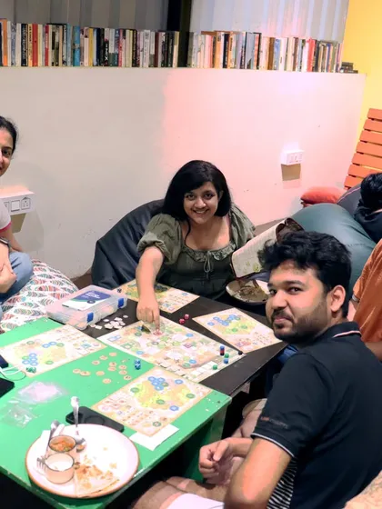 A fun game in progress, with snacks and drinks on the side. Our cafe is designed for hours of comfortable play.