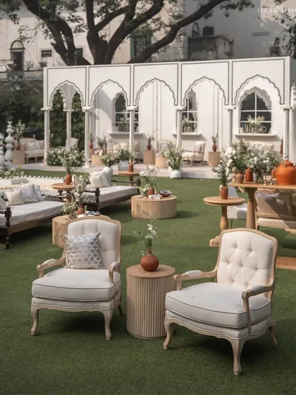 Elegant armchair seating provides a comfortable and stylish space for guests to enjoy the beautiful surroundings.