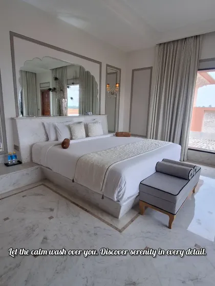 The serene and elegant bedroom at Buena Vista Resort. I focus on details like the plush bedding and classic decor to convey the comfort and luxury of the stay.