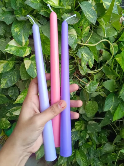 Another view of the pastel-colored taper candles.