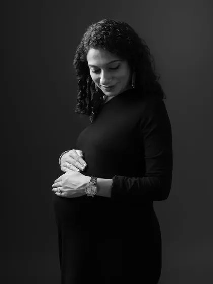 A duplicate of the contemplative close-up, focusing on the serene bond between mother and unborn child.