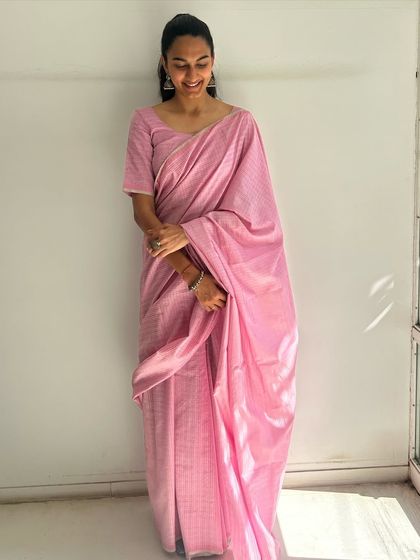 Our Karghewale's Garbhreshmi Saree in a lovely shade of pink. Woven from mercerized cotton, mulberry silk, and zari, it features a contemporary take on the classic Maheshwari dobby pattern.