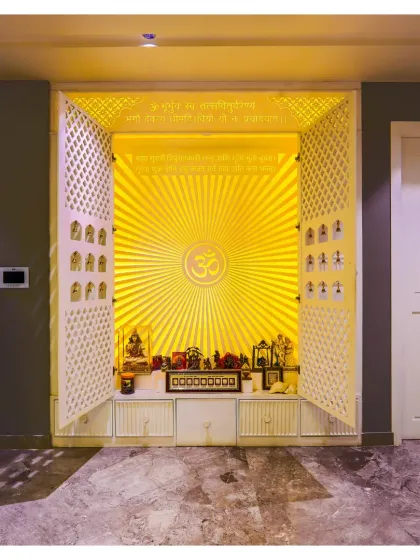 The mandir is the soul of a home. For this Gurgaon residence, I created a sacred space that radiates peace, using intricate jaali work and backlighting to create a divine glow. It’s a modern take on tradition and a focal point of tranquility for the family.