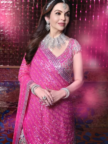 The ever gracious Mrs. Nita Ambani. For her Sangeet look, we created an atmosphere of elegance and celebration. The lighting was designed to complement the vibrant Falguni Shane Peacock outfit and the exquisite diamond jewelry, resulting in a portrait that is both grand and graceful.