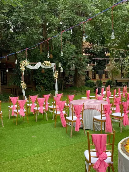 The garden setting at UTC is perfect for a romantic wedding reception. We enhanced its natural beauty with elegant decor, including a floral arch and colorful seating arrangements.