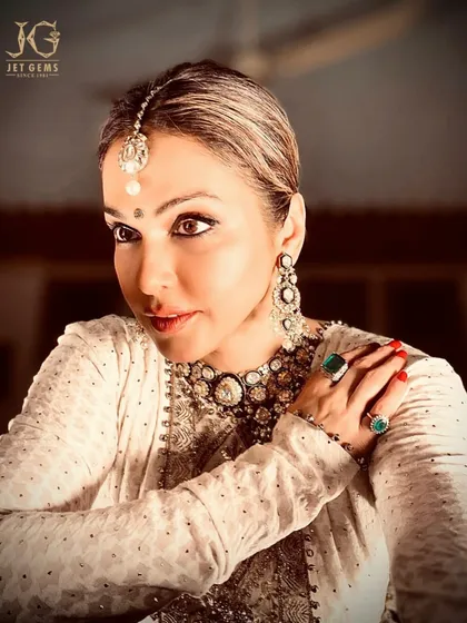 An illuminating elegance. The radiant Isha Koppikar Narang in my full Polki collection, including a statement choker, matching earrings, maang tikka, and bold emerald rings.