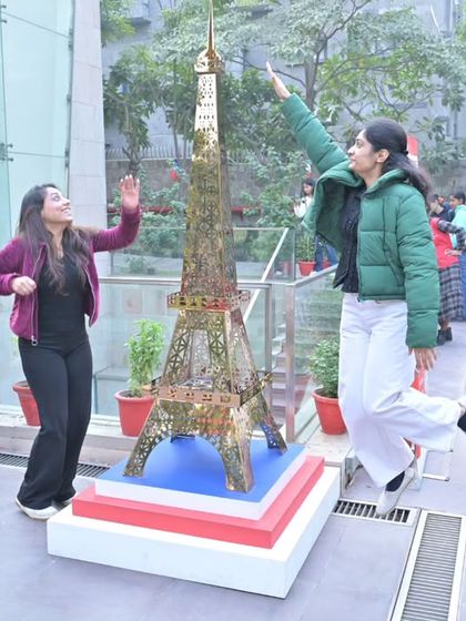 A throwback photo of students having fun at our Eiffel Tower photo prop during a past Open Day. Our events are filled with fun, interactive elements.