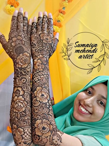 Another beautiful shot of my client Sara with her full floral bridal mehendi. The design covers her arms from fingertips to elbow.
