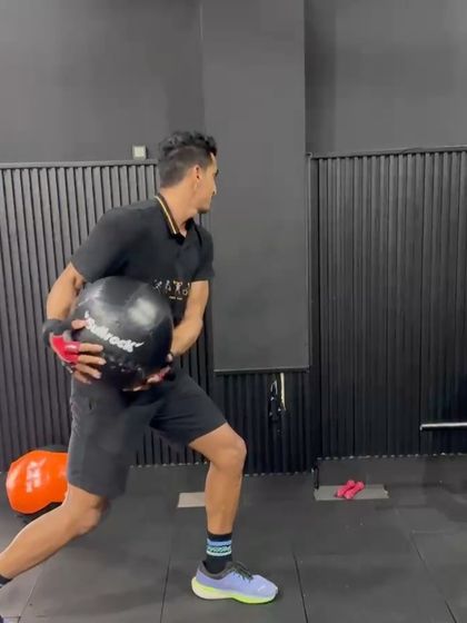 A rotational medicine ball throw, a key exercise for developing the explosive power needed for batting and bowling in cricket.