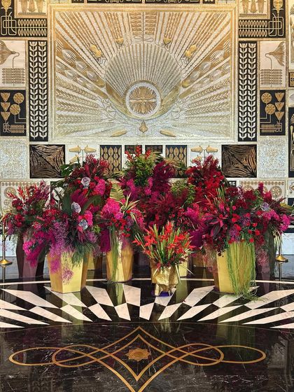 A wider shot showing the full collection of arrangements, designed to create an immersive field of color upon entry.