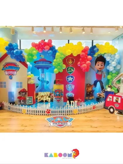 No job is too big, no pup is too small! Our Paw Patrol party is ready for action with a lookout tower backdrop, character cutouts, and a fire truck prop for a fourth birthday rescue mission.