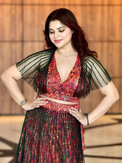 A full look at this stunning outfit for Lakmé Fashion Week. The makeup is kept elegant and polished to complement the bold, printed ensemble.