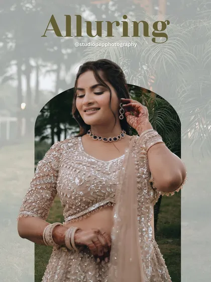 An artistic portrait of Pallavi, framed by an arch, with a soft, alluring quality that highlights her grace.