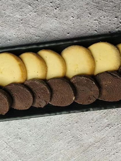 Chocolate and vanilla shortbread cookies, a simple yet elegant combination.