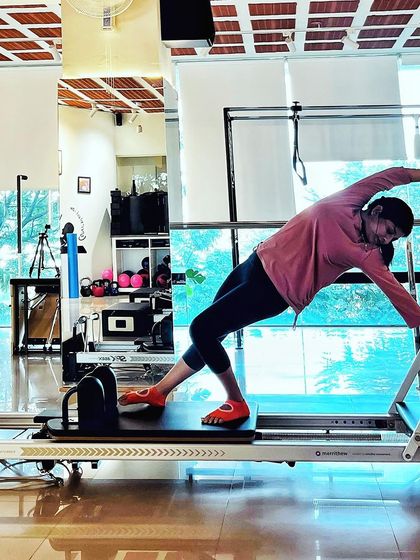 Stress less, Pilates more. This side bend, or mermaid stretch, on the reformer is a perfect way to melt away tension and find your inner calm.