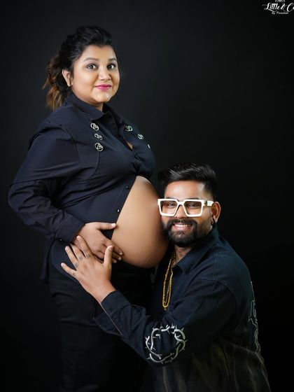 Another fun and engaging shot of the father-to-be listening to the baby bump. The direct look to the camera from both parents-to-be makes this a warm and inviting image.
