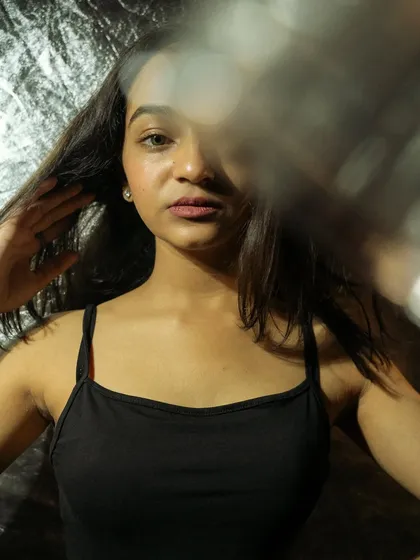 A series of creative headshots using glass and other objects in front of the lens to create distortion and blur. This technique adds an artistic, abstract layer to the portraits.