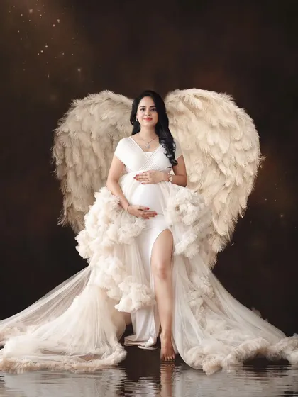 Motherhood gives you wings you never knew you had. This is for the mothers who are creating life, a true angel on earth. A dramatic and powerful portrait from a studio maternity session.