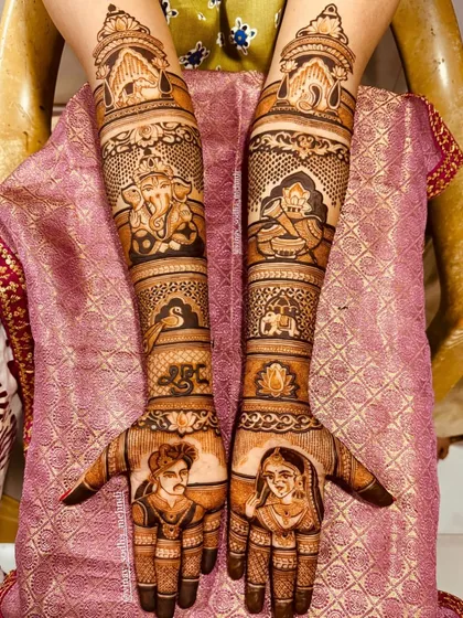 A complete bridal design featuring portraits of the couple, Lord Ganesha for blessings, and other auspicious symbols to celebrate their new beginning.