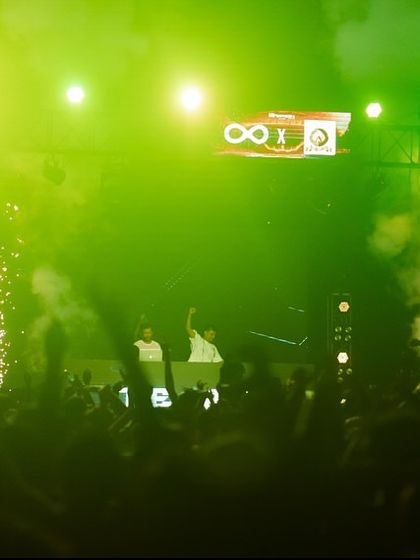 The stage at IIT Patna lit up in vibrant green during my set.