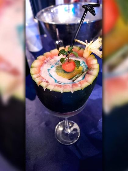 A truly unique creation served inside a hollowed-out watermelon. This cocktail is not just a drink but a conversation starter, perfect for tropical-themed or summer parties.