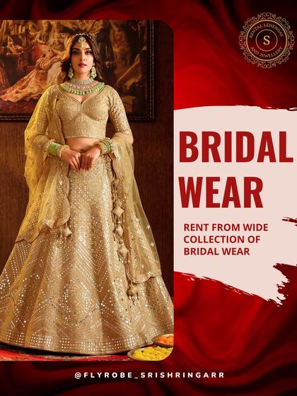 This golden bridal lehenga is pure elegance. It's perfect for the bride who wants a sophisticated and royal look for her wedding or reception.