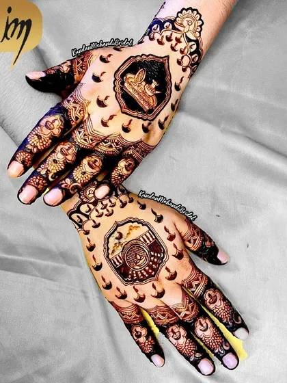 A unique take on Karwa Chauth mehndi, with small, framed scenes of a diya and a kalash, surrounded by delicate patterns.