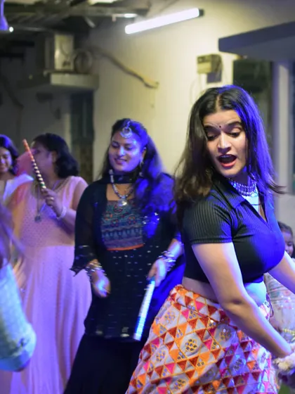 A candid shot from our outdoor Garba night. The energy under the lights was magical.