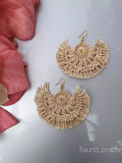 These unique crochet earrings have a bohemian feel with their fringe detail. They are lightweight and perfect for a beachy vibe.