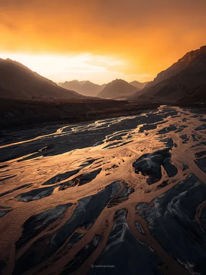 The sky on fire over the Spiti River in Kaza. I captured this with my drone during a particularly dramatic sunset, where the entire valley was bathed in an intense orange glow.