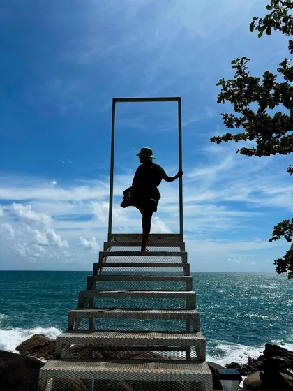 A silhouette of my emerald green resort dress against the stunning Phuket seascape. I design my vacation wear to be as dramatic and beautiful as the destinations you travel to.