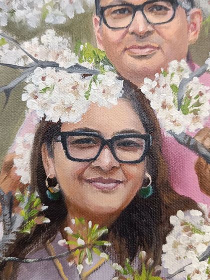 Close-up of the wife in the cherry blossom portrait.