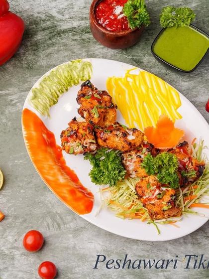 This is our Peshawari Tikka Chicken. Marinated with a distinct blend of spices from the Peshawari region, it offers a robust and aromatic flavour profile.