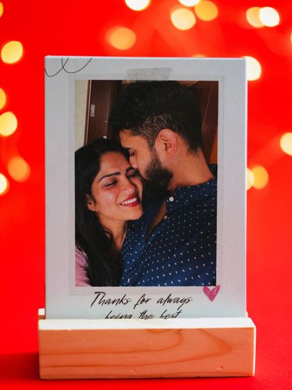 A personalized photo stand with a heartfelt message, a perfect addition to any Mother's Day gift.