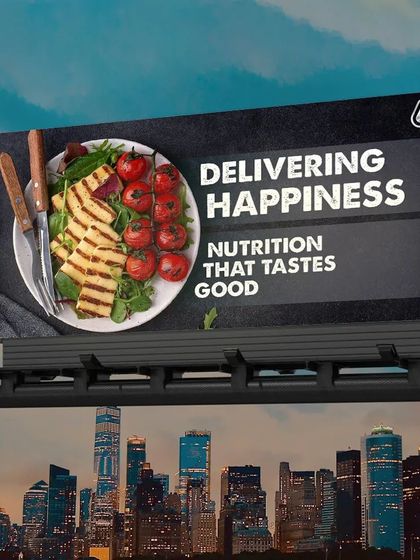 We are delivering happiness in the form of nutrition that tastes good. This billboard graphic represents our large-scale commitment to making healthy food accessible across the city.