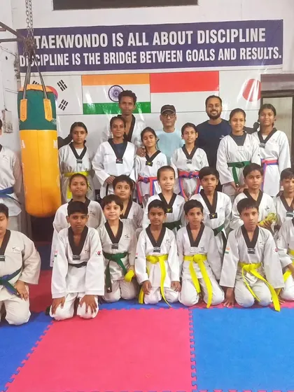 A group photo of all the students who successfully passed their belt promotion test. We celebrate every step of progress together.