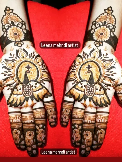 A striking design with peacocks whose feathers fan out to create a mandala. This is a creative and artistic take on a traditional motif.