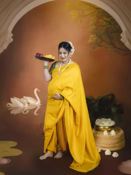 For a truly unique maternity portrait, we offer artistic sessions inspired by the timeless paintings of Ravi Varma. This image showcases the classic, painterly style we can create, turning your maternity photo into a piece of fine art.