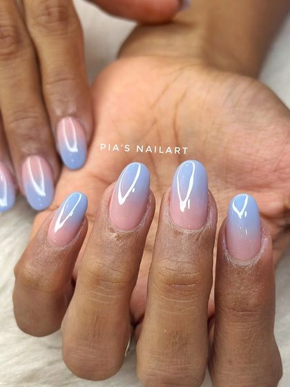 Muted powder blue ombre nails. A soft and dreamy color combination that's a unique take on the classic ombre.