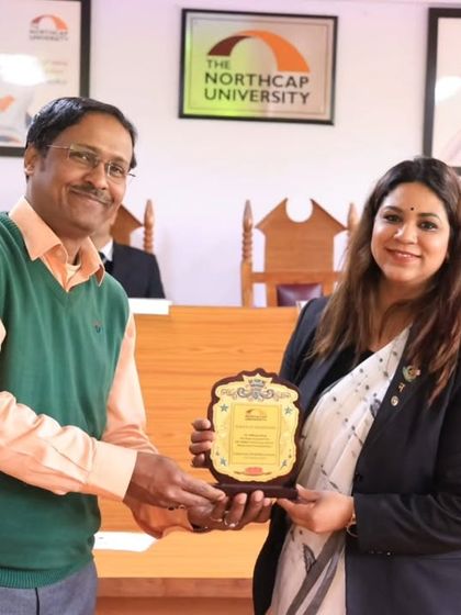 A moment of appreciation as I receive a plaque from a faculty member at The NorthCap University. It was an honor to contribute my time and expertise to their prestigious moot court competition.