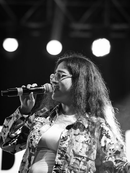 A black and white photo from my live show in Ahmedabad. It captures the raw emotion and focus that goes into every single performance.